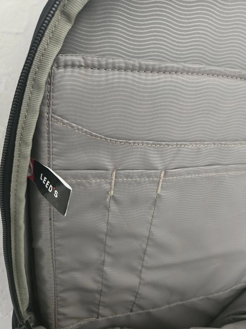 Thule Black Backpack with Innoviva Specialty Therapeutics Logo
